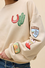 Daydreamer Western Patches Oversized Crew Sweatshirt in Sand