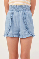 Hayden Girls Smocked Waist Ruffled Shorts in Light Denim